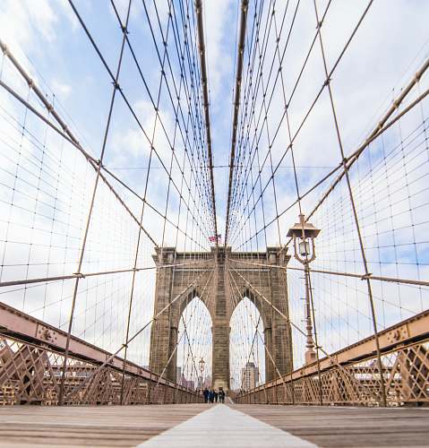 brooklyn bridge people walking at Brooklyn Bridge during daytime new york